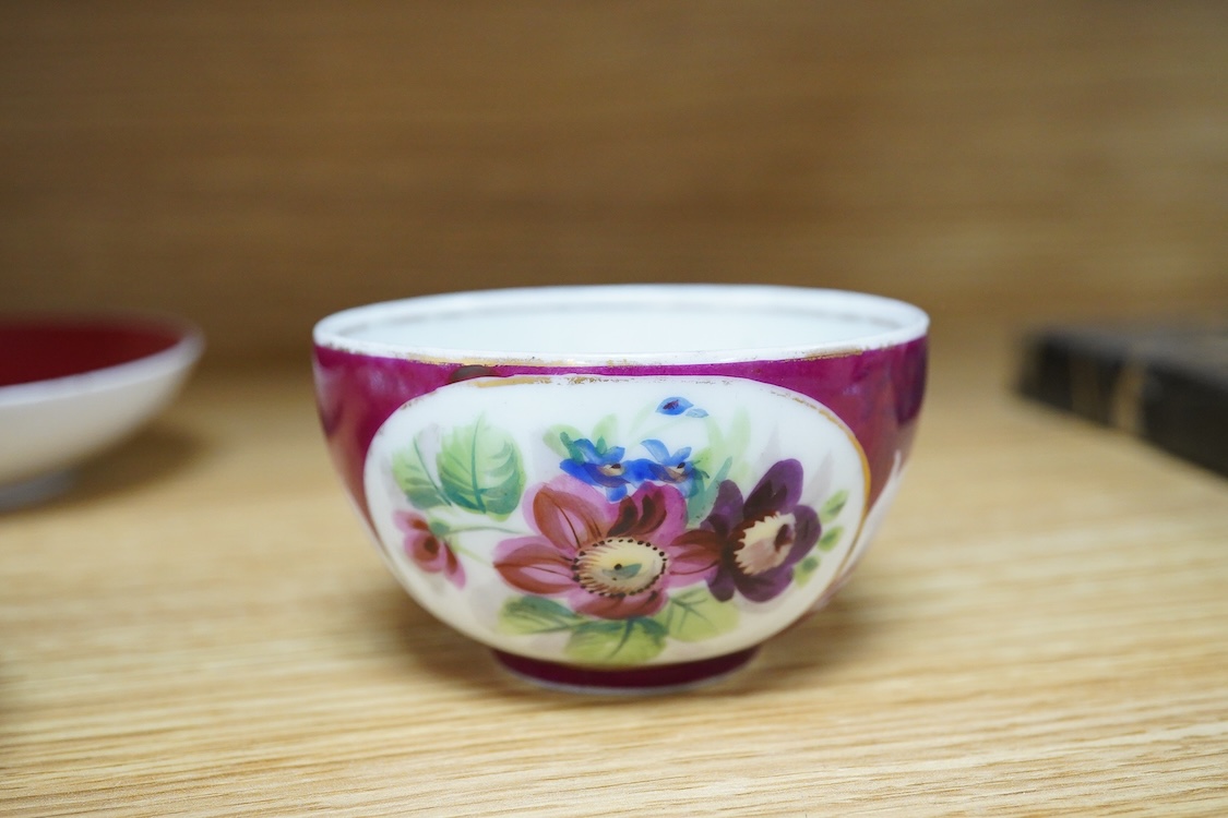 An 18th century Delft plate, two tin-glazed dishes and candlestick, a Gardener Russian porcelain tea cup and saucer, and a mug with liner, largest 22cm in diameter